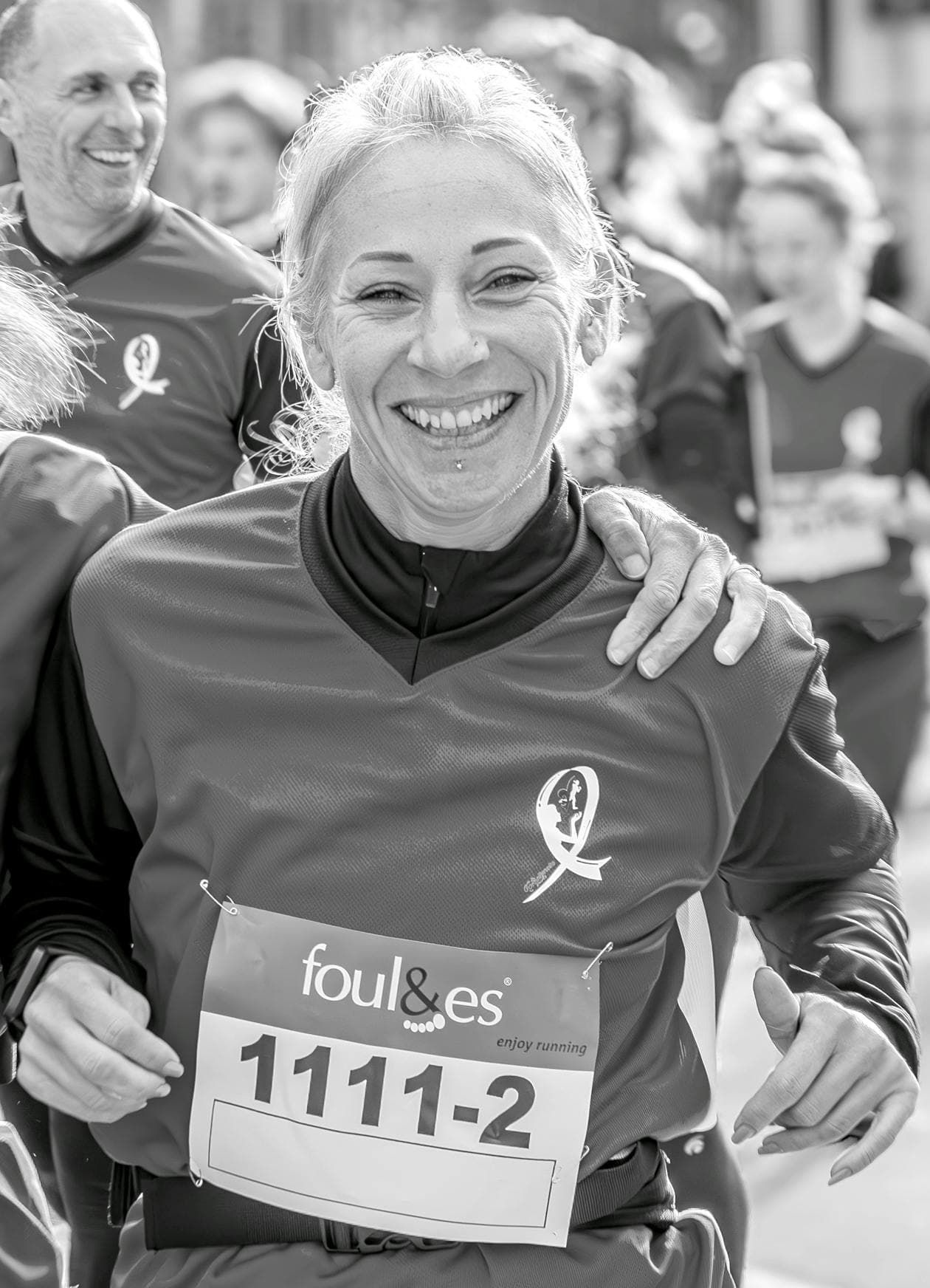Smiling runner at a race event